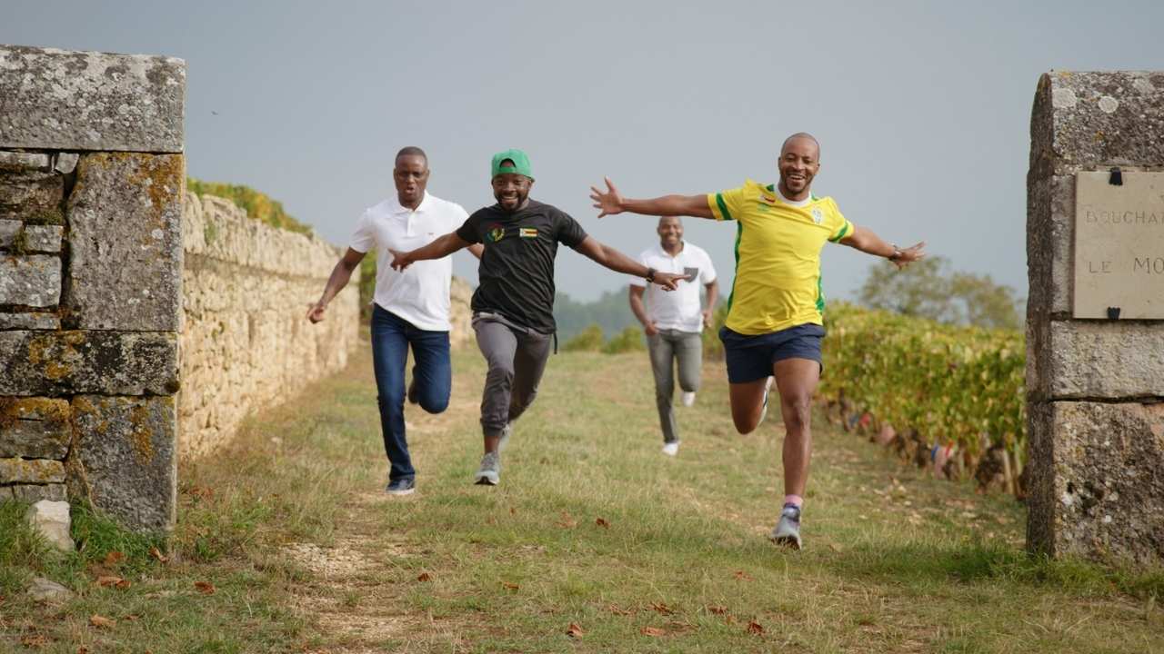 four men running